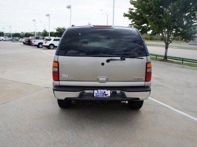 gmc yukon 2003 brown suv slt flex fuel 8 cylinders 4 wheel drive automatic 76108