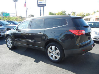chevrolet traverse 2011 black suv ltz gasoline 6 cylinders all whee drive 6 speed automatic 55391