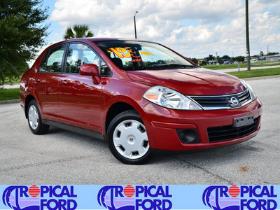 nissan versa 2010 red sedan gasoline 4 cylinders front wheel drive automatic 32837