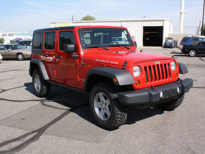 jeep wrangler unlimited 2011 red suv rubicon gasoline 6 cylinders 4 wheel drive automatic 80229