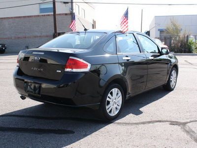ford focus 2010 black sedan sel gasoline 4 cylinders front wheel drive automatic with overdrive 80229