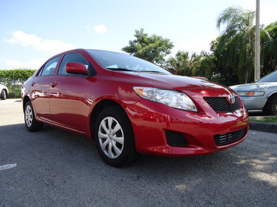toyota corolla 2010 red sedan le gasoline 4 cylinders front wheel drive automatic 33177