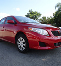 toyota corolla 2010 red sedan le gasoline 4 cylinders front wheel drive automatic 33177