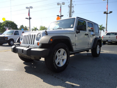 jeep wrangler unlimited 2010 silver suv sport gasoline 6 cylinders 2 wheel drive automatic 33177
