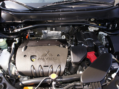 mitsubishi outlander 2009 black suv es gasoline 4 cylinders front wheel drive automatic 76018
