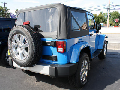 jeep wrangler 2012 blue suv sahara gasoline 6 cylinders 4 wheel drive 6 speed manual 07730