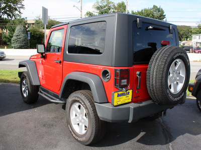 jeep wrangler 2008 red suv rubicon gasoline 6 cylinders 4 wheel drive 6 speed manual 07730