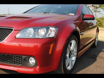 pontiac g8 2009 red sedan gasoline 6 cylinders rear wheel drive automatic 75570