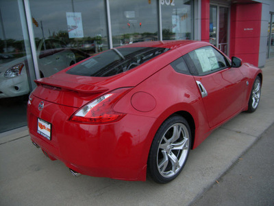 nissan 370z 2011 red coupe gasoline 6 cylinders rear wheel drive not specified 46219