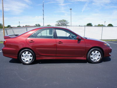 toyota camry 2006 red sedan se gasoline 4 cylinders front wheel drive automatic 47129