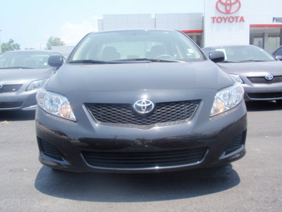 toyota corolla 2010 black sedan le gasoline 4 cylinders front wheel drive automatic 34788