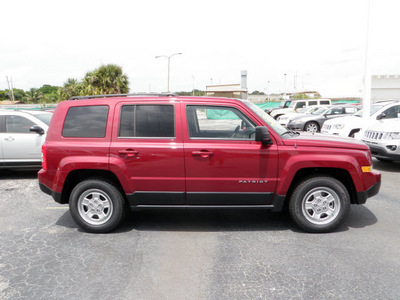 jeep patriot 2011 red suv sport gasoline 4 cylinders 2 wheel drive automatic 33021