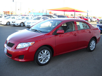 toyota corolla 2010 red sedan gasoline 4 cylinders front wheel drive automatic 79925