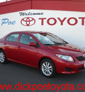 toyota corolla 2010 red sedan gasoline 4 cylinders front wheel drive automatic 79925