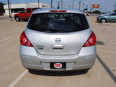 nissan versa 2010 silver hatchback 1 8 s gasoline 4 cylinders front wheel drive automatic 75228