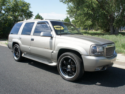 cadillac escalade 1999 silver suv custom wheels gasoline v8 4 wheel drive automatic with overdrive 80012