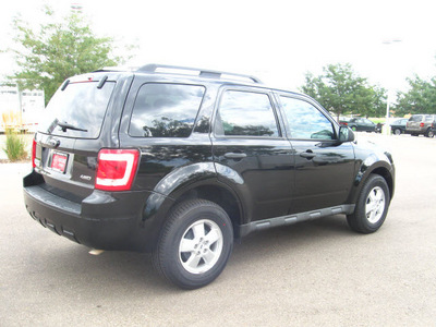 ford escape 2009 black suv xlt gasoline 6 cylinders 4 wheel drive automatic 80504