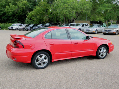 pontiac grand am 2004 red sedan se gasoline 6 cylinders front wheel drive automatic 55318