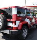 jeep wrangler unlimited 2011 red suv sahara gasoline 6 cylinders 4 wheel drive automatic 07730