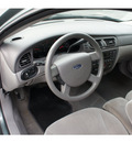 ford taurus 2006 light tundra sedan se gasoline 6 cylinders front wheel drive automatic 07724