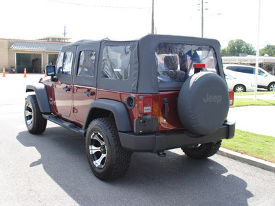 jeep wrangler unlimited 2010 red suv sport gasoline 6 cylinders 4 wheel drive automatic 27591