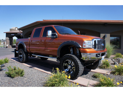 ford f 250 super duty 2006 orange xlt diesel 8 cylinders 4 wheel drive automatic with overdrive 99352