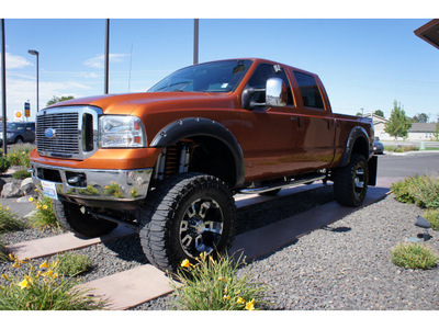 ford f 250 super duty 2006 orange xlt diesel 8 cylinders 4 wheel drive automatic with overdrive 99352