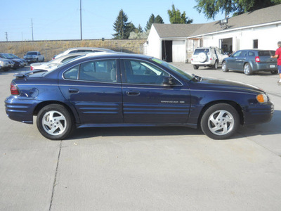pontiac grand am 2000 blue sedan se1 gasoline 6 cylinders front wheel drive 4 speed automatic 99212