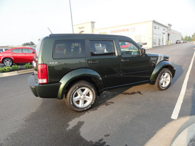 dodge nitro 2010 dk green suv sxt gasoline 6 cylinders 4 wheel drive 4 speed automatic 60915