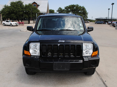 jeep commander 2006 black suv gasoline 6 cylinders rear wheel drive automatic 76087