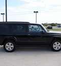 jeep commander 2006 black suv gasoline 6 cylinders rear wheel drive automatic 76087