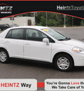 nissan versa 2010 white sedan 1 8 gasoline 4 cylinders front wheel drive automatic with overdrive 56001