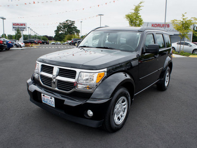 dodge nitro 2011 black suv se gasoline 6 cylinders 4 wheel drive automatic 98371