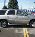 cadillac escalade 2003 tan suv luxury gasoline 8 cylinders all whee drive automatic 13502