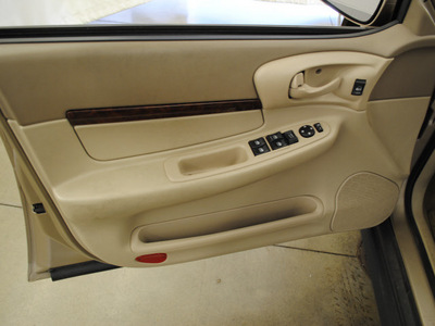 chevrolet impala 2005 tan sedan base gasoline 6 cylinders front wheel drive automatic 44060