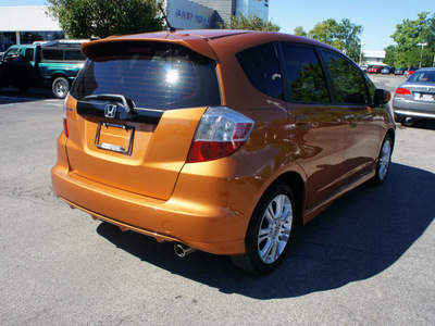 honda fit 2010 orange hatchback sport gasoline 4 cylinders front wheel drive shiftable automatic 46168