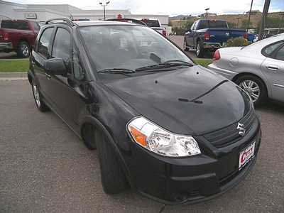 suzuki sx4 2009 black pearl met hatchback crossover gasoline 4 cylinders all whee drive automatic 81212