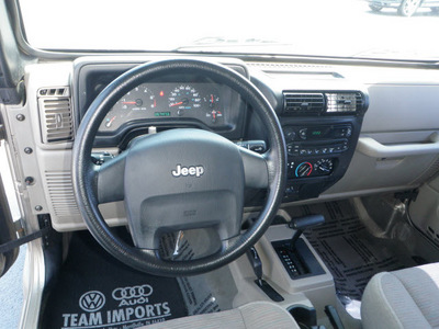 jeep wrangler 2005 beige suv x gasoline 6 cylinders 4 wheel drive automatic 46410