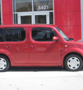 nissan cube 2009 red suv gasoline 4 cylinders front wheel drive automatic 33884