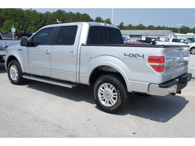 ford f 150 2011 silver lariat gasoline 6 cylinders 4 wheel drive automatic 77388