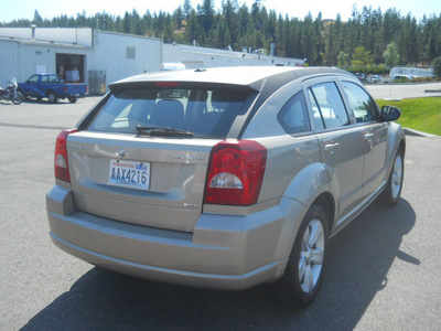 dodge caliber 2010 gold wagon sxt gasoline 4 cylinders front wheel drive automatic 99212