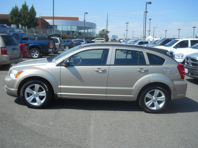 dodge caliber 2010 gold wagon sxt gasoline 4 cylinders front wheel drive automatic 99212