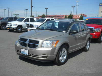 dodge caliber 2010 gold wagon sxt gasoline 4 cylinders front wheel drive automatic 99212