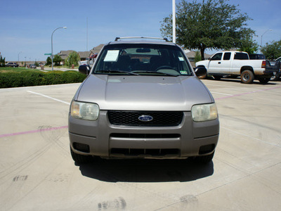 ford escape 2001 beige suv xls 4 cylinders 5 speed manual 76108