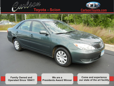 toyota camry 2006 dk  green sedan le gasoline 4 cylinders front wheel drive automatic 55448