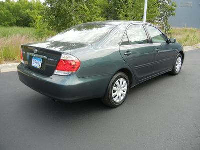 toyota camry 2006 dk  green sedan le gasoline 4 cylinders front wheel drive automatic 55448