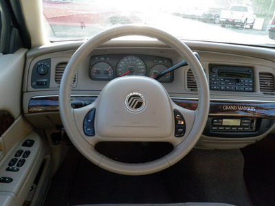mercury grand marquis 2004 beige sedan ls premium gasoline 8 cylinders rear wheel drive 4 speed automatic 55321