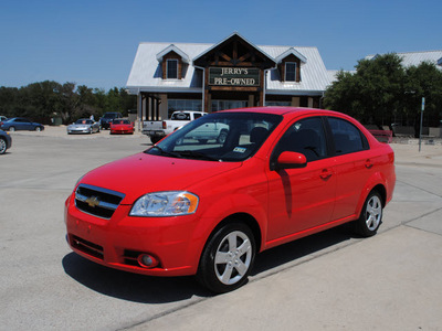 chevrolet aveo 2011 red sedan lt gasoline 4 cylinders front wheel drive automatic 76087