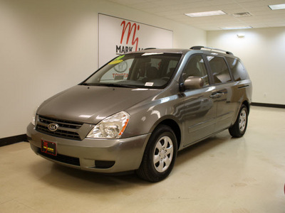 kia sedona 2010 charcoal van sedona gasoline 6 cylinders front wheel drive automatic 27707