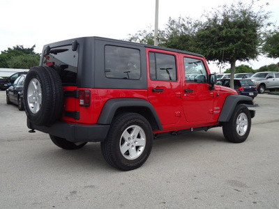 jeep wrangler unlimited 2010 red suv sport gasoline 6 cylinders 2 wheel drive automatic 33157